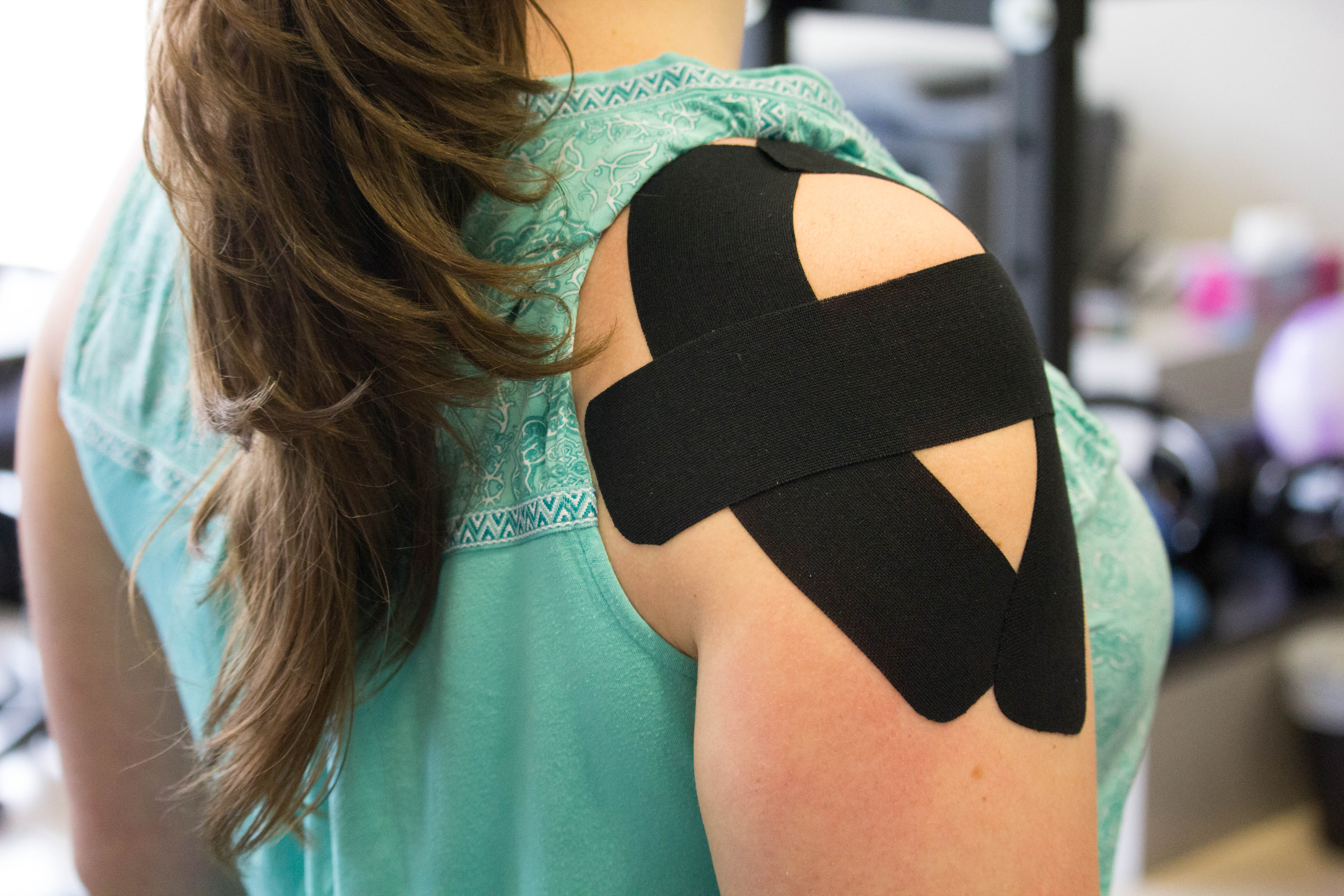 athletic taping on shoulder